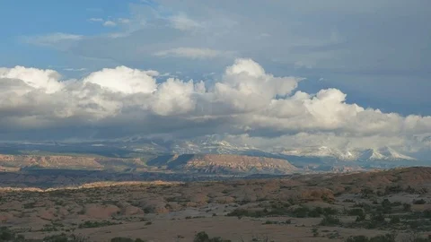 Zoom in on a cloud covered la sal mountains in utah Stock Footage 76375400