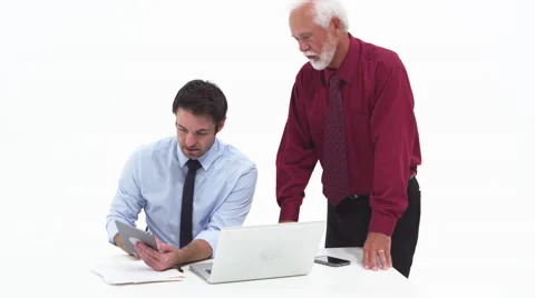 Zoom in of coworkers using tablet and smiling Video stock 67354308