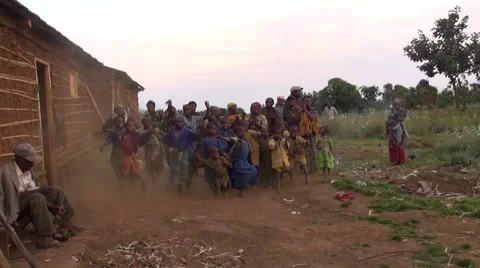 Zoom in, dancing tribe of pygmies, Uganda Stock Footage 44323761