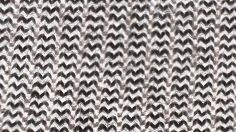Zoom in on a detailed view of knitted elastic fabric, ideal for crafting support Stock Footage 250308317