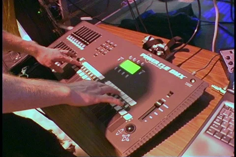 Zoom of DJ Working at Board Stock Footage 144349
