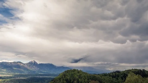 Zoom in dramatic time lapse clouds forming after summer storm Stock Footage 129079498