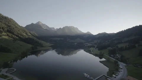Zoom in drone flight over a lake in Interlaken, Switzerland in the Alps. Stock Footage 201651372