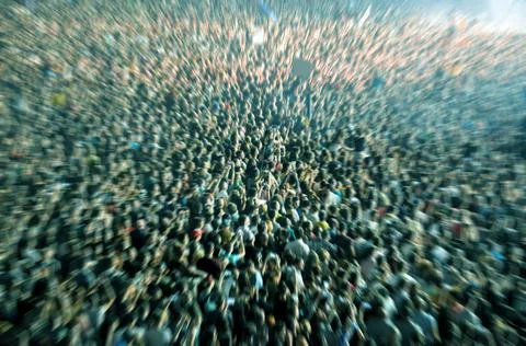 Zoom in effect on a blurred crowd Stock Photos