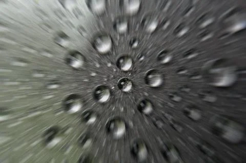 Zoom effect of raindrops on dark cover suitable for wallpaper concept. Stock Photos