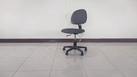 Zoom In on Empty Black Swivel Office Chair in Bright Room Stock Footage 341846784