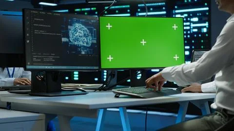 Zoom in of expert in data center using artificial intelligence on mockup PC 스톡 사진