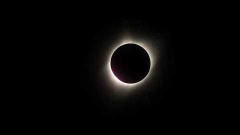 Zoom-in on the first diamond ring effect at Contact 2 during a total solar Stock Footage 274042167