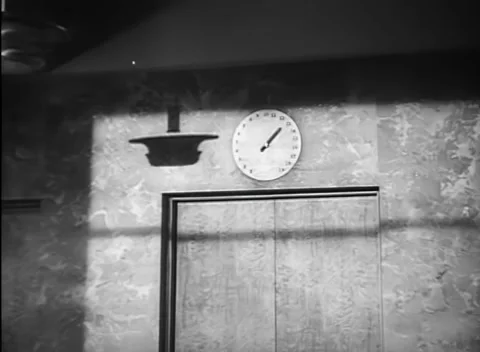 Zoom into floor indicator above elevator, 1940s 스톡 동영상 260258612