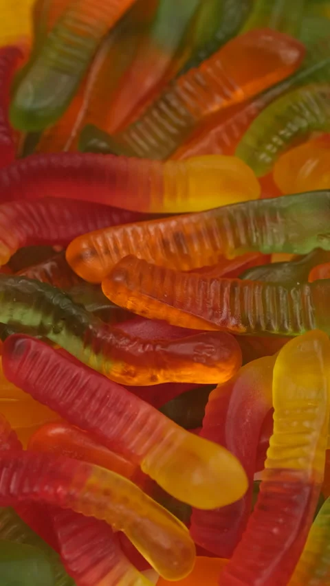 Zoom frame Colorful gummy candy jelly worms, close up Stock Footage 305023867