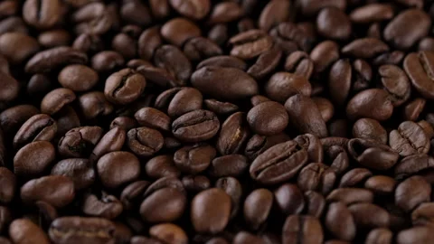 Zoom frame dark roast coffee beans, rotation Stock Footage 252563764