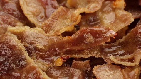 Zoom frame fried bacon close up, rotation. Traditional breakfast Stock-Footage 246534622