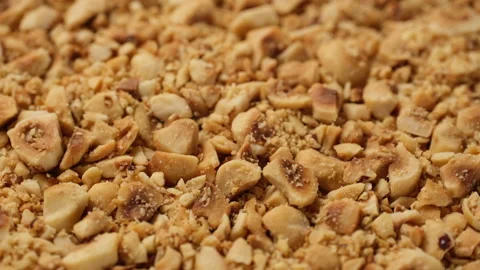 Zoom frame ground roasted hazelnuts close up Video stock 250307873
