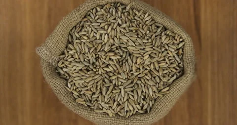 Zoom of a full sack of rye grain. View from above. Stock Footage 142712748