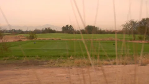 Zoom in green golf course Stock Footage 125278788