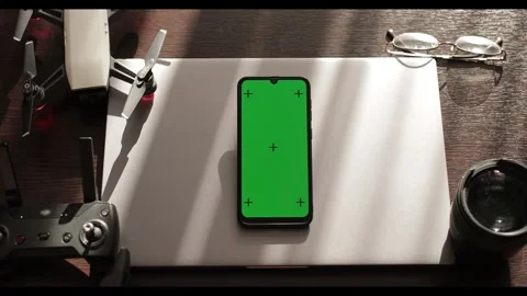 Zoom in green screen with motion capture points on the phone. The cellphone of a Stock Footage 278296069