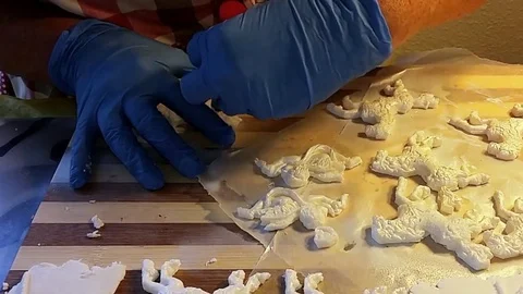 Zoom: Hands Making Gum Paste Carousel Horses Stock Footage 79113978