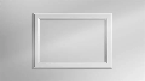 Zoom in on horizontal white empty picture frame on gray wall with shadows Stock Footage 333361122