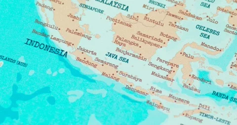 Zoom in of the java sea region on a vintage political world map Видео 347684697