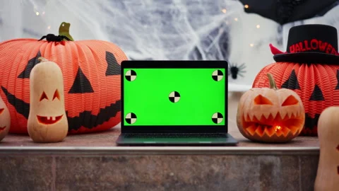 Zoom in laptop with a green screen with dots for tracking movement against the Stock Footage 251747597