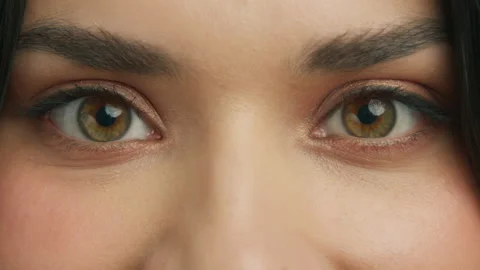 Zoom in macro hazelnut green eyes beautiful woman, hazelnut brown eyeball iris Stock Footage 236937596