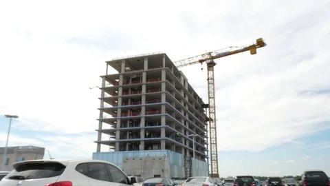 Zoom In of Man Climbing Down Crane Stock Footage 80751140