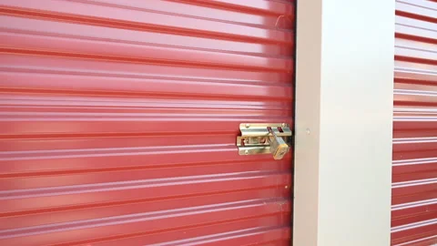 Zoom in on a Master Lock on a storage unit. Quality protection. Stock Footage 219808954