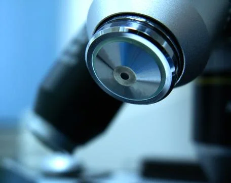 Zoom on microscope lens Stock Photos
