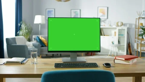 Zoom in On a Modern Personal Computer with Mock-up Green Screen Display Standing Stock Footage 94956909