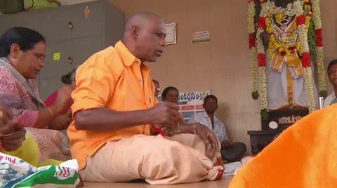 Zoom MS of people singing prayers in Tirupati, India Stock Footage 58766436