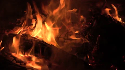 Zoom on oak logs on fire at night, orange flames. Stock Footage 157836075