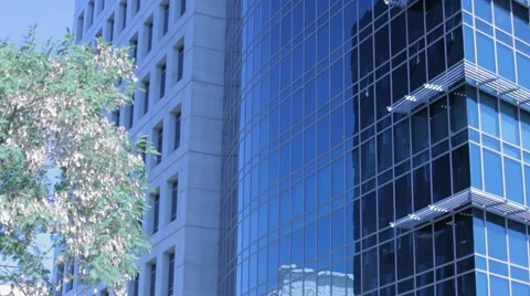 Zoom in on an office building windows Stockbeeldmateriaal 57139224