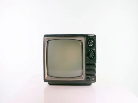 Zoom in on old fashioned TV on white background Stock Footage 84974587