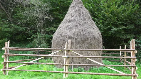 Zoom in on an old hay stack Stock Footage 42420418