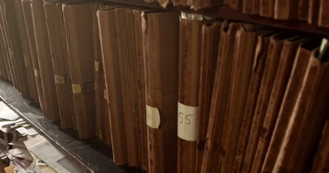 Zoom to one of many folders in shelf Stock Footage 76091776