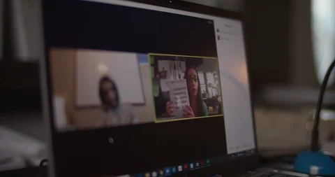 Zoom Online Tutoring. Teacher & Student Remote Classroom. Teacher on screen Stock Footage