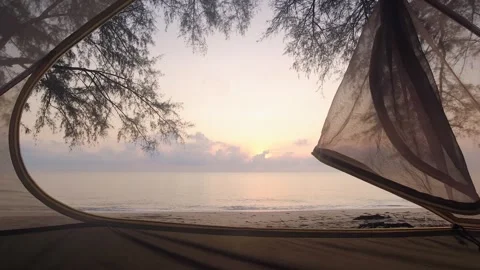 Zoom in open tent view from inside panoramic view to spectacular sunrise on.. Stock Footage 276496311