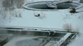 Zoom out from aeration tanks of industrial treatment plant HD Footage