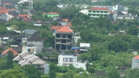 Zoom Out from Bali Landscape Through GWK Statue Window 4K Vídeos de archivo 336620814