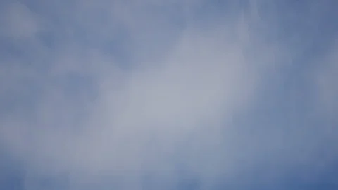 Zoom out beautiful white cloud with blue sky background at day time Stock Footage 129267079