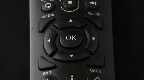 Zoom out on a black remote control 4K Stock Footage 47244810