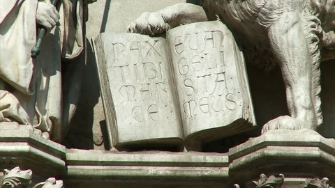 Zoom out from close up of  Doge Statue, Venice, Itlay Stock Footage 74343282
