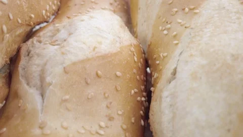Zoom out close up pan on bread loaves Stock Footage 328339438