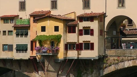 Zoom out from close up of the Ponte Vecchio Florence, Italy Stock Footage 74798059