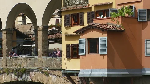 Zoom out from close up of the Ponte Vecchio Florence, Italy Stock Footage 74801063