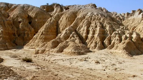 Zoom out from close up of rock formations - Bardenas Riales Natural Park, Spain Stock Footage 74600744