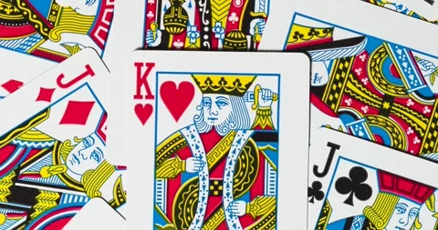 Zoom out of a common card deck face cards background Video stock 328319700
