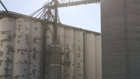 Zoom out of Concrete Grain Elevator Stock Footage 73024380