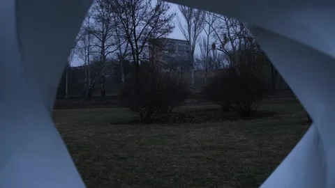 Zoom out dark building in abstract white form in winter time on Ukraine, Mariupo Vídeos de archivo 170674092