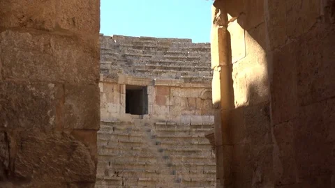 Zoom out of a door of the coliseum in Jerash Stock-Footage 83595108